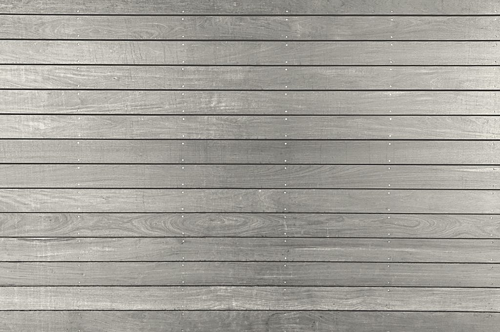 Before: Same deck boards before and after staining
